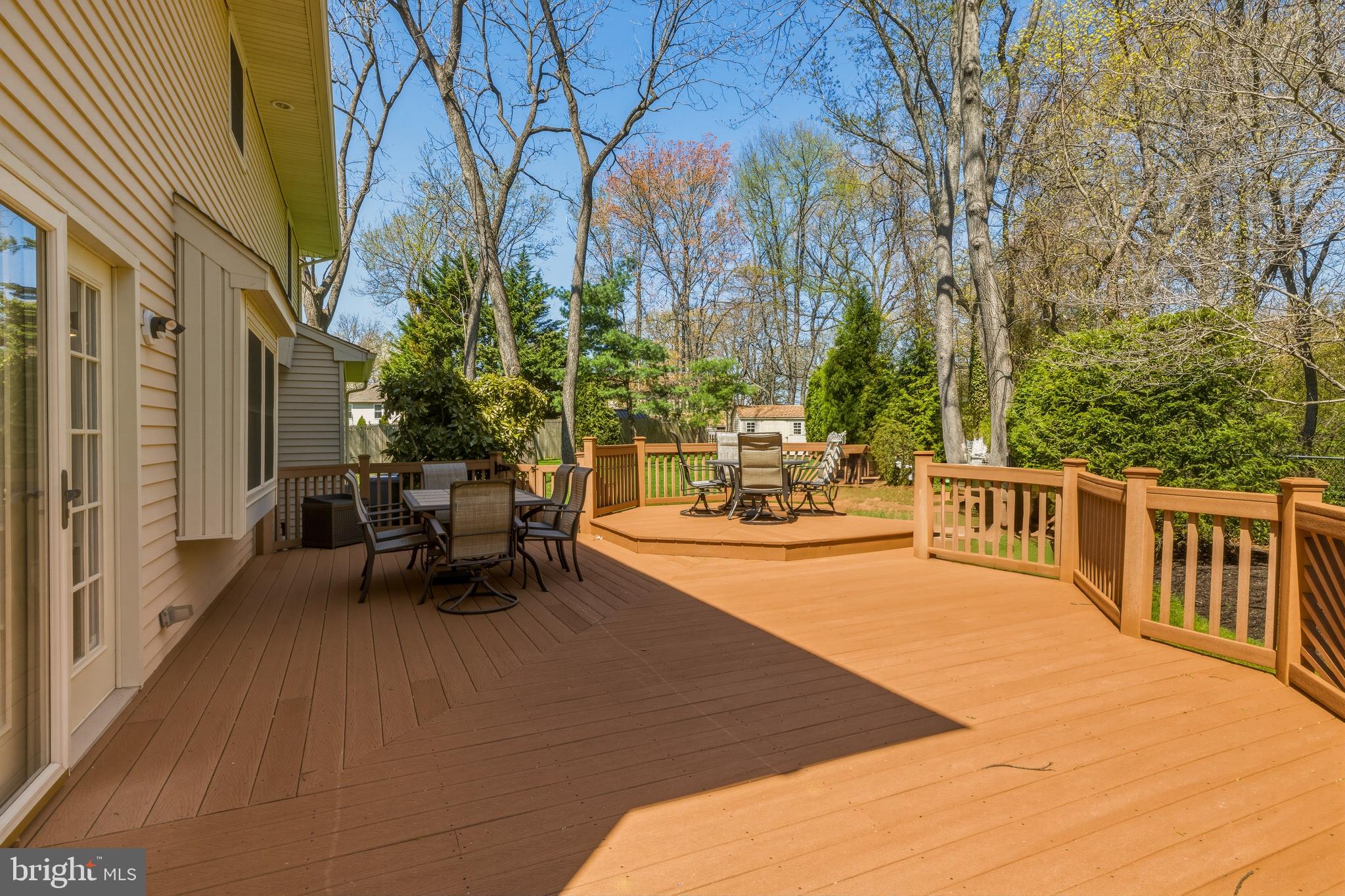 8 Rothschild Court West Deptford, NJ 08096 - Photo 25 of 29 a view of a patio with table and chairs and potted plants with large tree