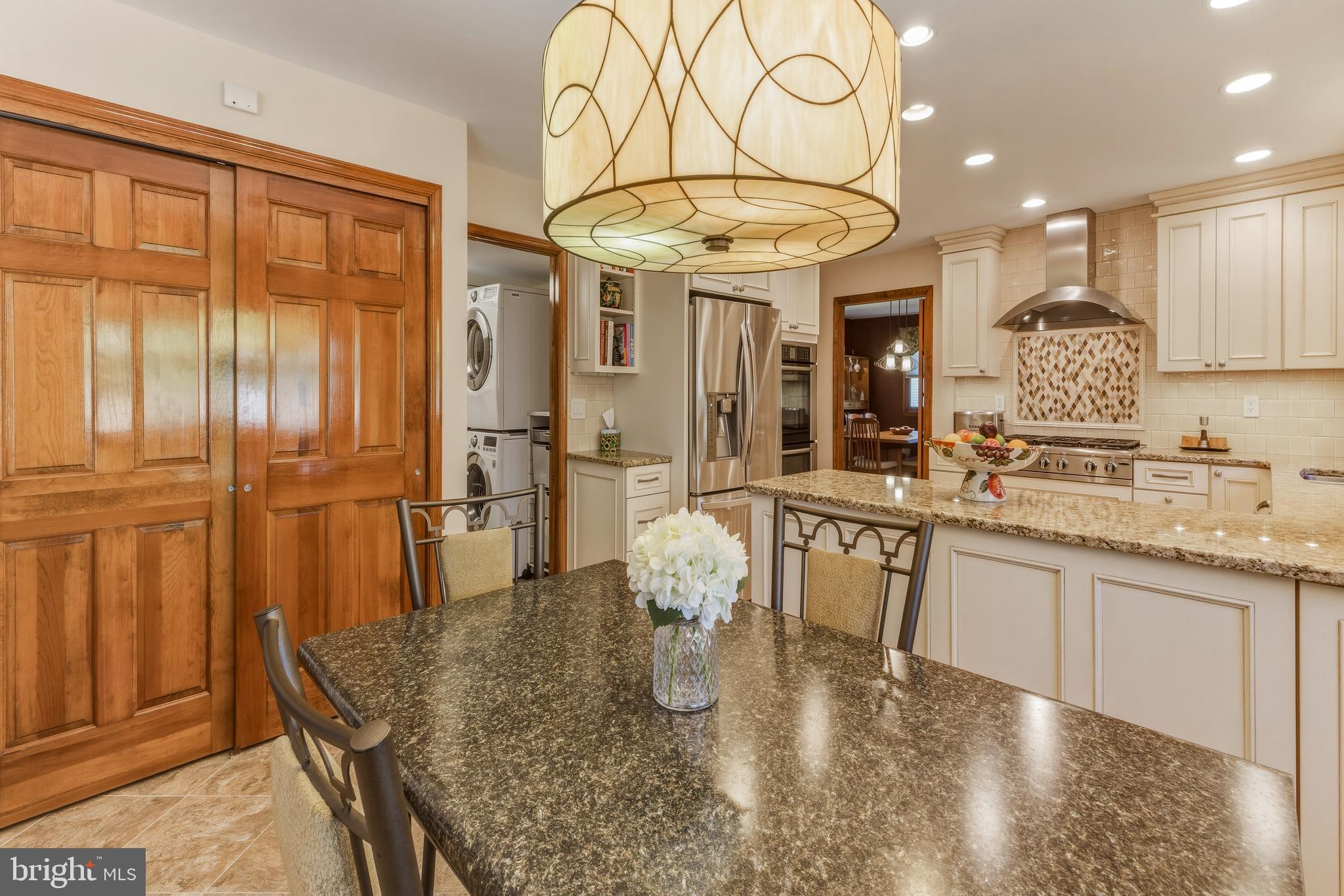 8 Rothschild Court West Deptford, NJ 08096 - Photo 7 of 29 a kitchen with stainless steel appliances granite countertop a sink and cabinets