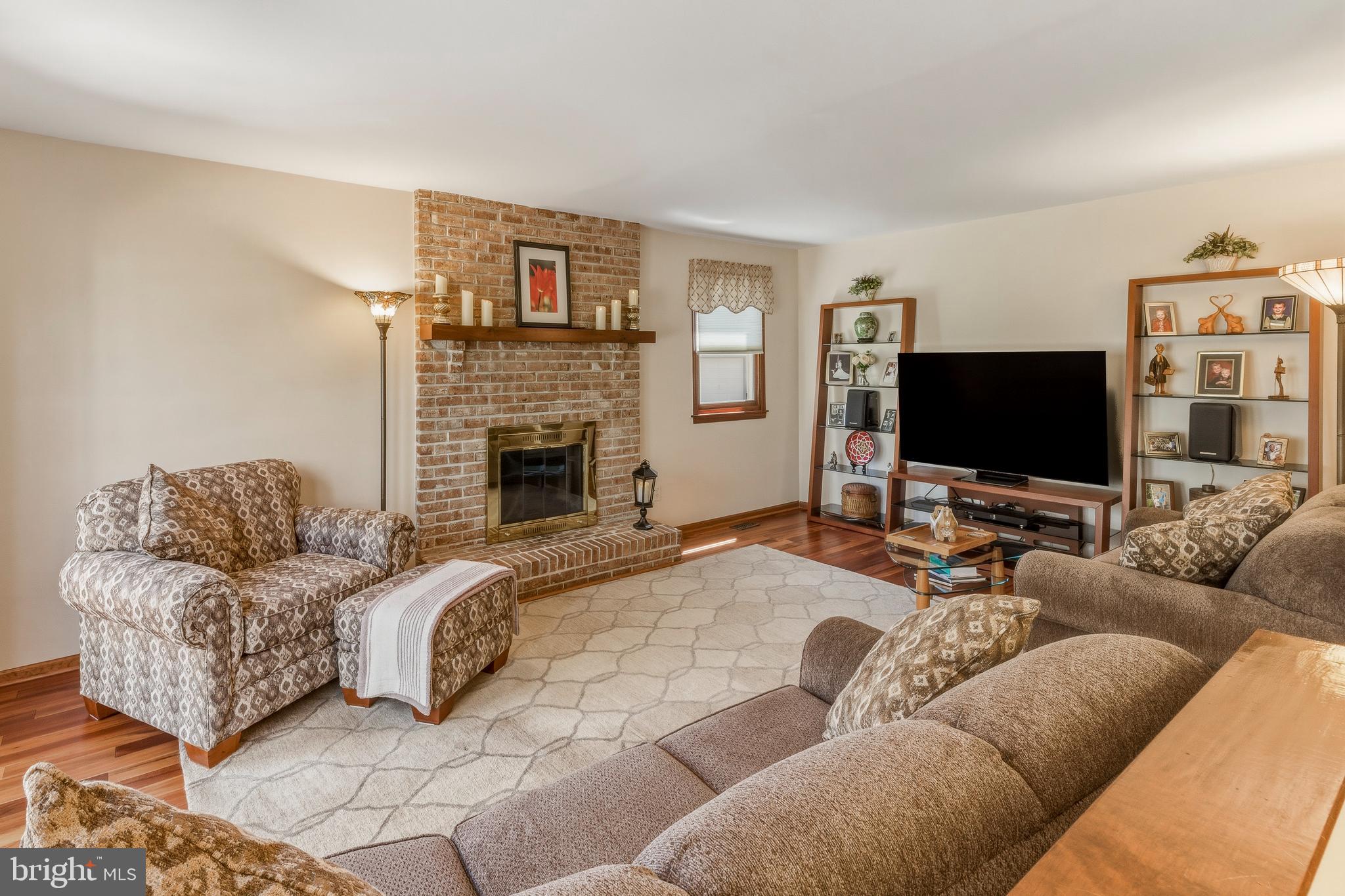 8 Rothschild Court West Deptford, NJ 08096 - Photo 9 of 29 a living room with furniture and a flat screen tv