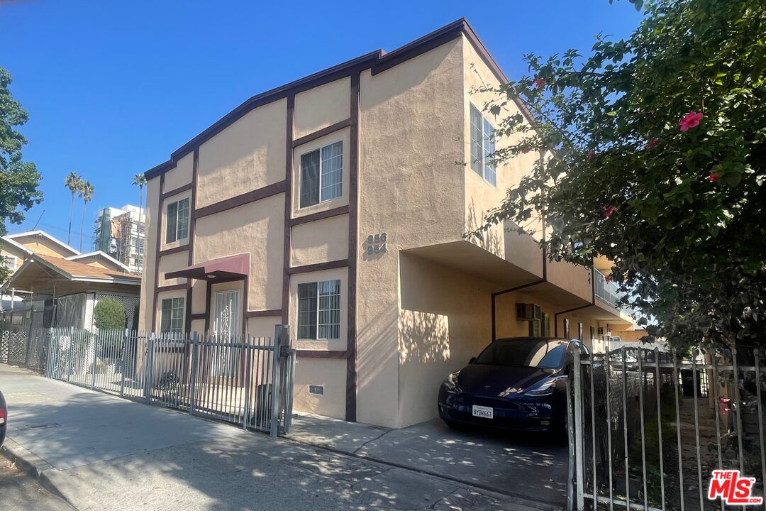 a front view of a house with parking