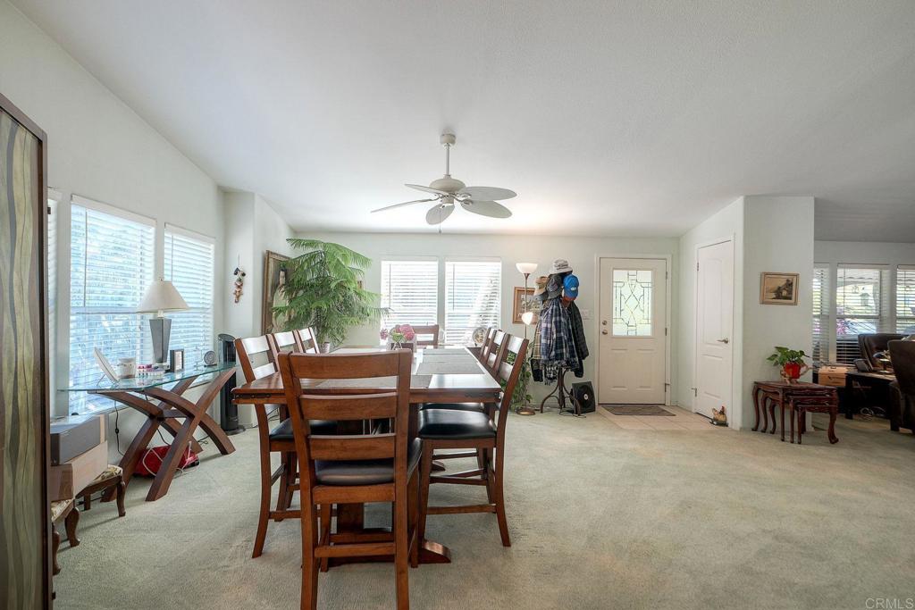 18218 Paradise Mountain Road Valley Center, CA 92082 - Photo 13 of 36 a dining room with furniture window and outside view
