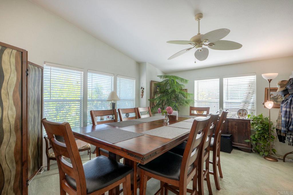 18218 Paradise Mountain Road Valley Center, CA 92082 - Photo 14 of 36 a view of a dining room with furniture window and outside view