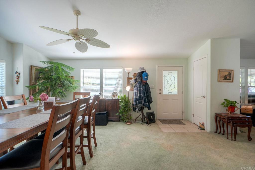 18218 Paradise Mountain Road Valley Center, CA 92082 - Photo 17 of 36 a view of a livingroom and dining room