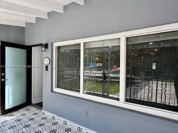 a view of a large window with an outdoor space