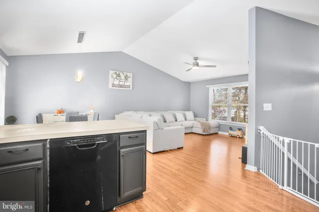 a spacious bathroom with a double vanity sink and a mirror
