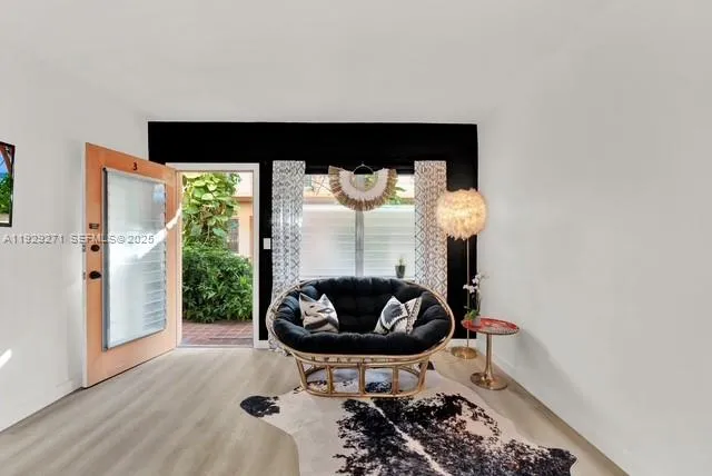 a bedroom with a bed and a lamp on table