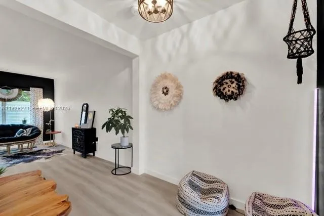 a kitchen with stainless steel appliances granite countertop a sink and wooden cabinets