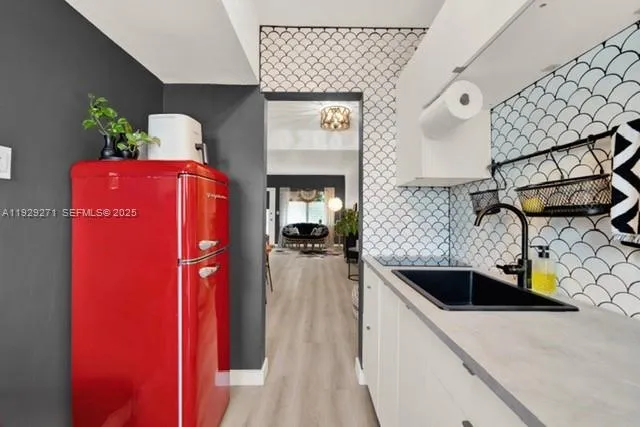 an aerial view of a house with a garden