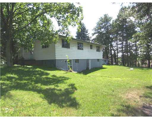 3468 Cedar Ridge Road Allison Park, PA 15101 - Photo 6 of 8 Exterior Back. TtHIS IS THE REAR OF THIS LOVELY RANCH TO THE FAR RIGHT IS THE 2 CAR ATTCHED GARAGE AND A POSSIBLE FUTURE DECK.