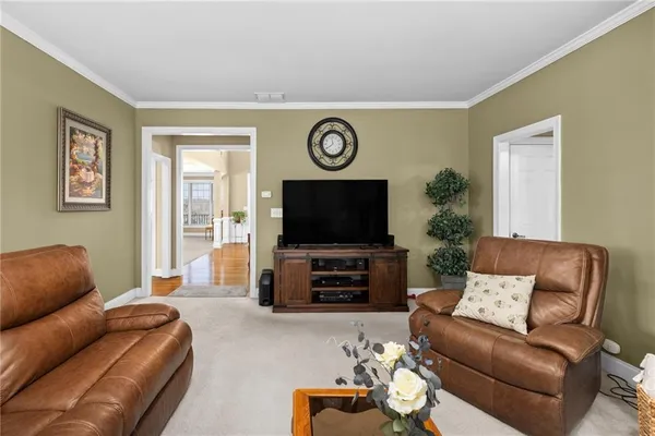 a view of hallway with furniture