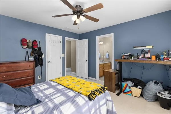 an aerial view of a house with a lake view