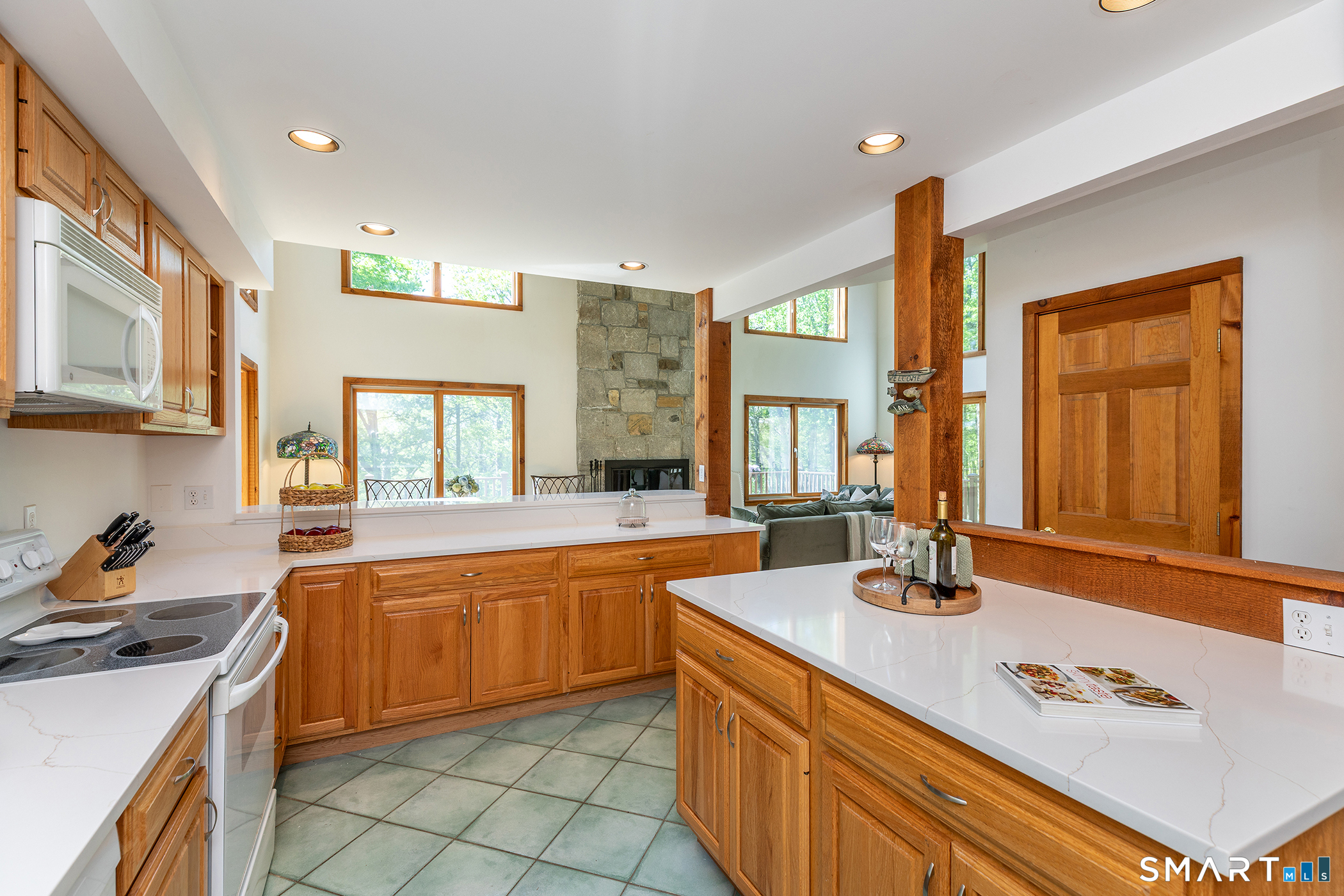 3 Old Forest Road Sherman, CT 06784 - Photo 17 of 38 a kitchen with granite countertop a sink stainless steel appliances and cabinets