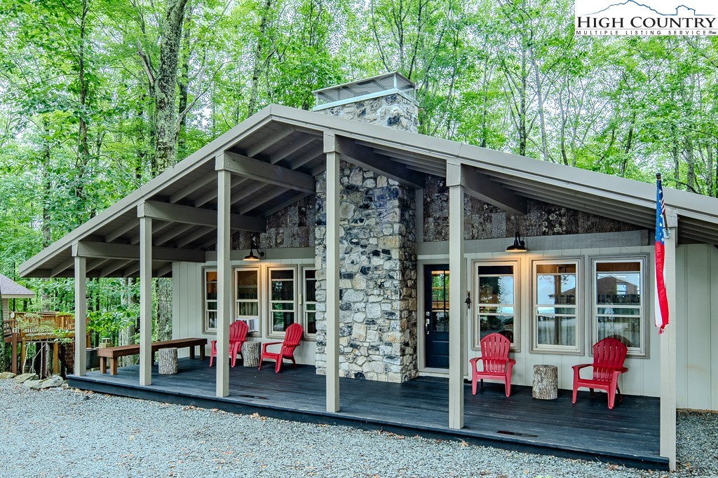 821 Pine Ridge Road Beech Mountain, NC 28604 - Photo 2 of 38 a view of house with a patio