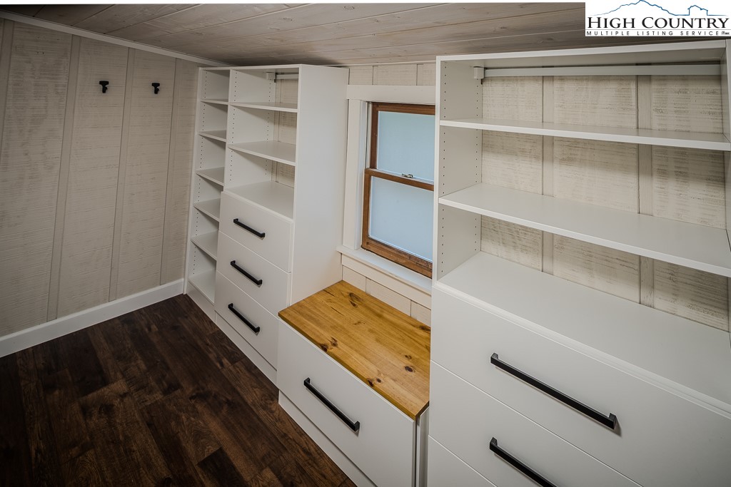 821 Pine Ridge Road Beech Mountain, NC 28604 - Photo 24 of 38 a view of walk in closet with empty racks