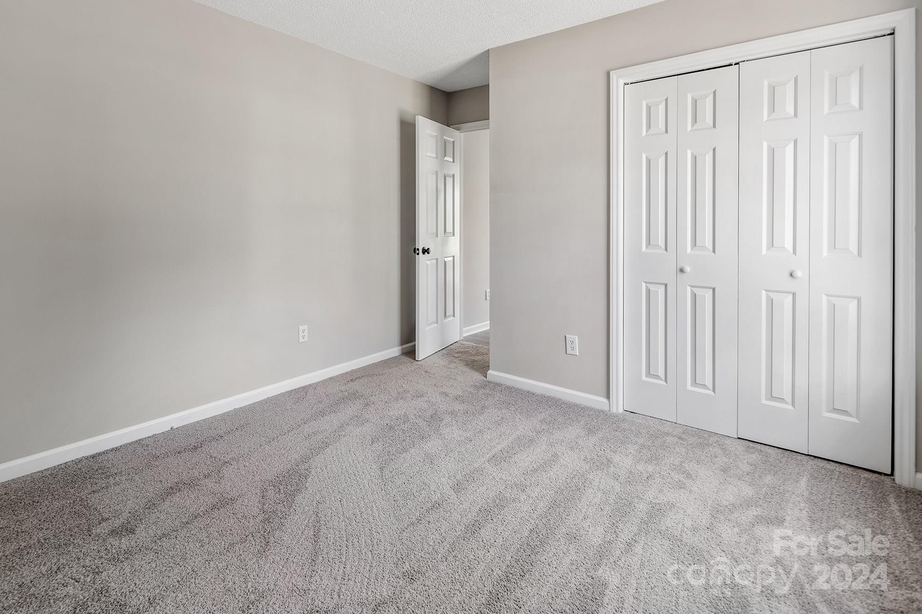 8567 Unity Church Road Denver, NC 28037 - Photo 27 of 38 a view of an empty room with a entryway