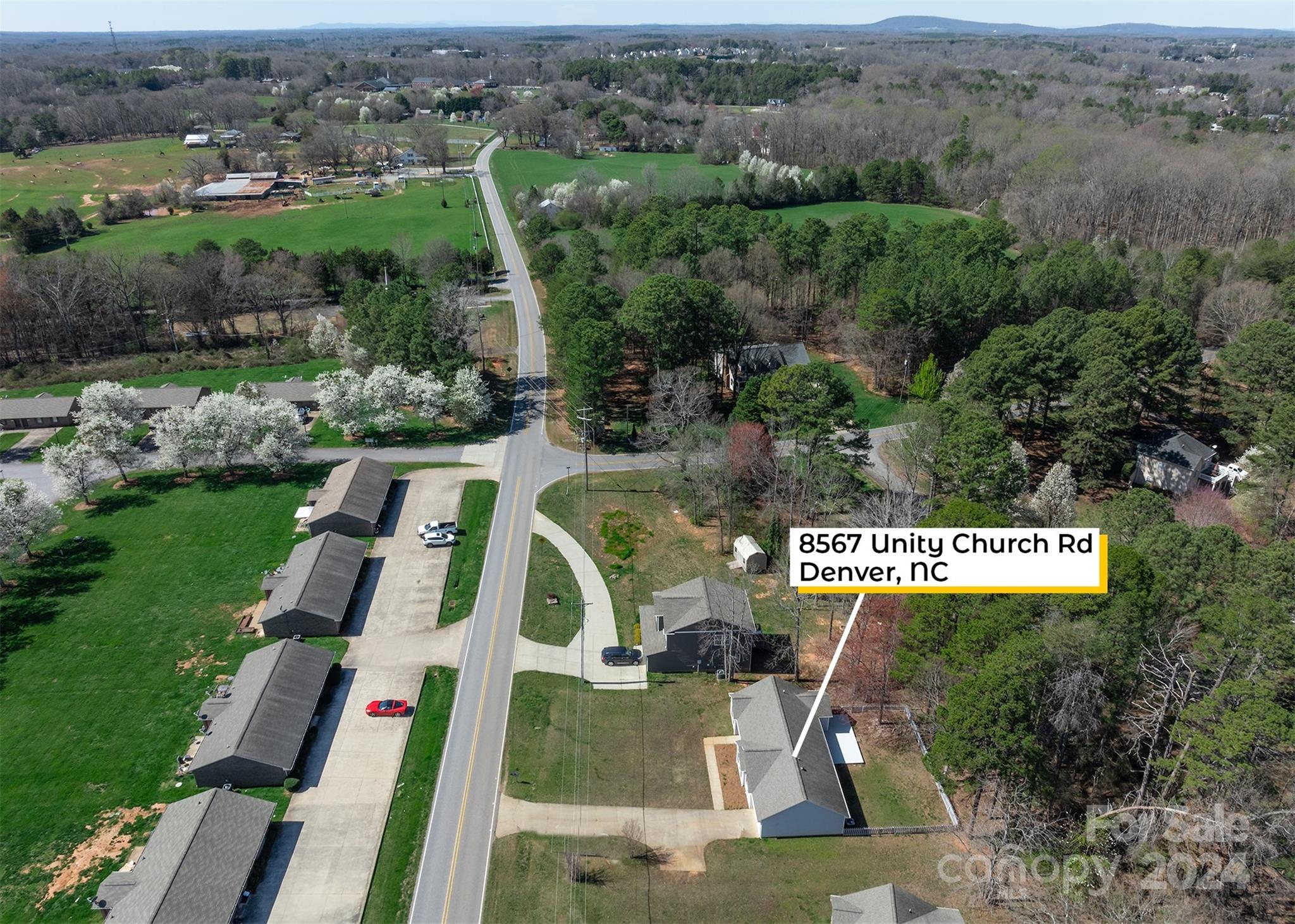 8567 Unity Church Road Denver, NC 28037 - Photo 36 of 38 an aerial view of residential house with outdoor space