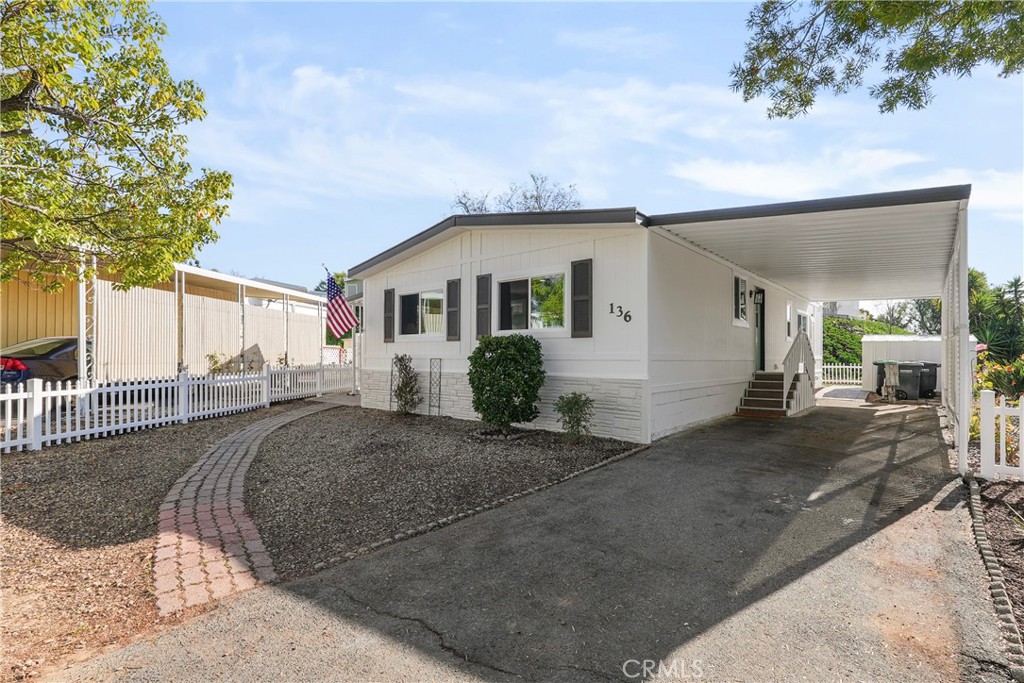 31130 South General Kearny Road, Unit 136 Temecula, CA 92591 - Photo 12 of 65 a view of a house with a yard