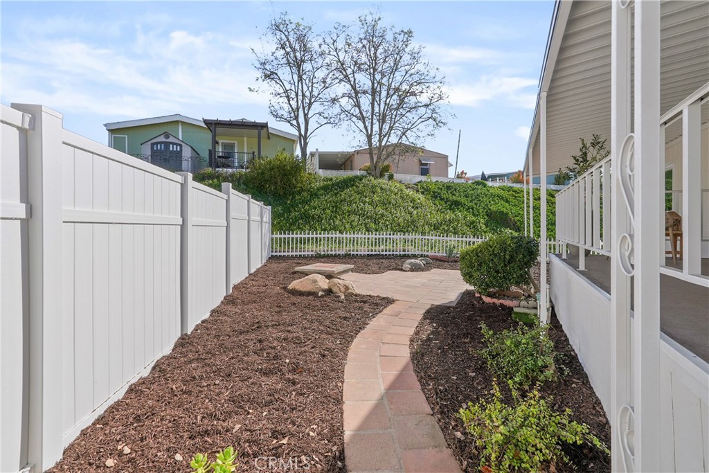 31130 South General Kearny Road, Unit 136 Temecula, CA 92591 - Photo 13 of 65 a view of a house with a yard