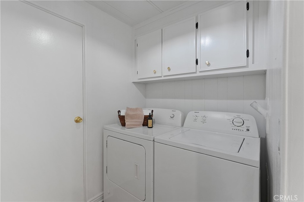 31130 South General Kearny Road, Unit 136 Temecula, CA 92591 - Photo 34 of 65 Laundry room has cabinets and great storage (washer and dryer do not stay)