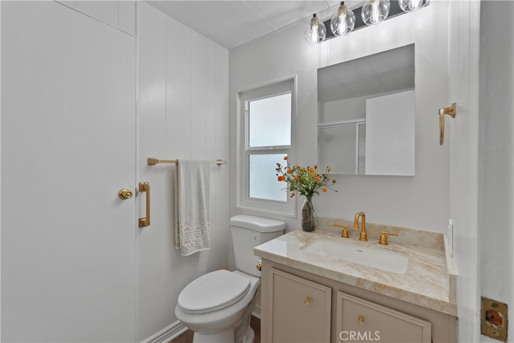 31130 South General Kearny Road, Unit 136 Temecula, CA 92591 - Photo 35 of 65 Bathroom 2 has new lighting, new quartz counters, new faucet, new toilet, new paint and flooring!