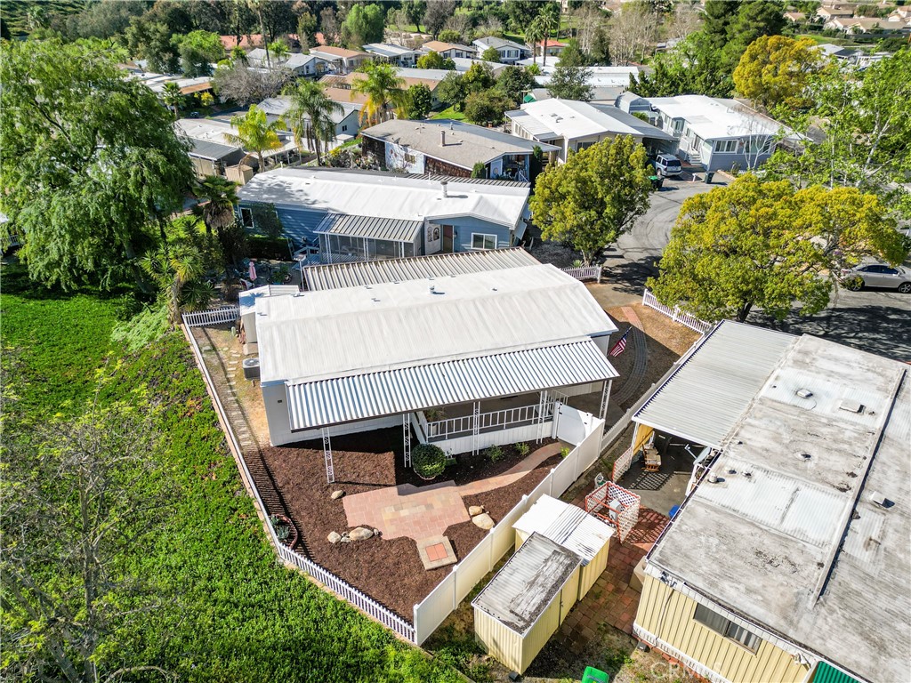 31130 South General Kearny Road, Unit 136 Temecula, CA 92591 - Photo 5 of 65 an aerial view of a house with garden space and street view