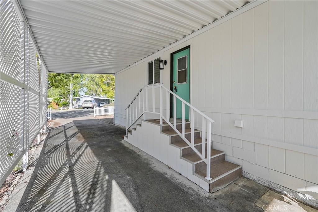 31130 South General Kearny Road, Unit 136 Temecula, CA 92591 - Photo 53 of 65 a view of entryway with wooden floor