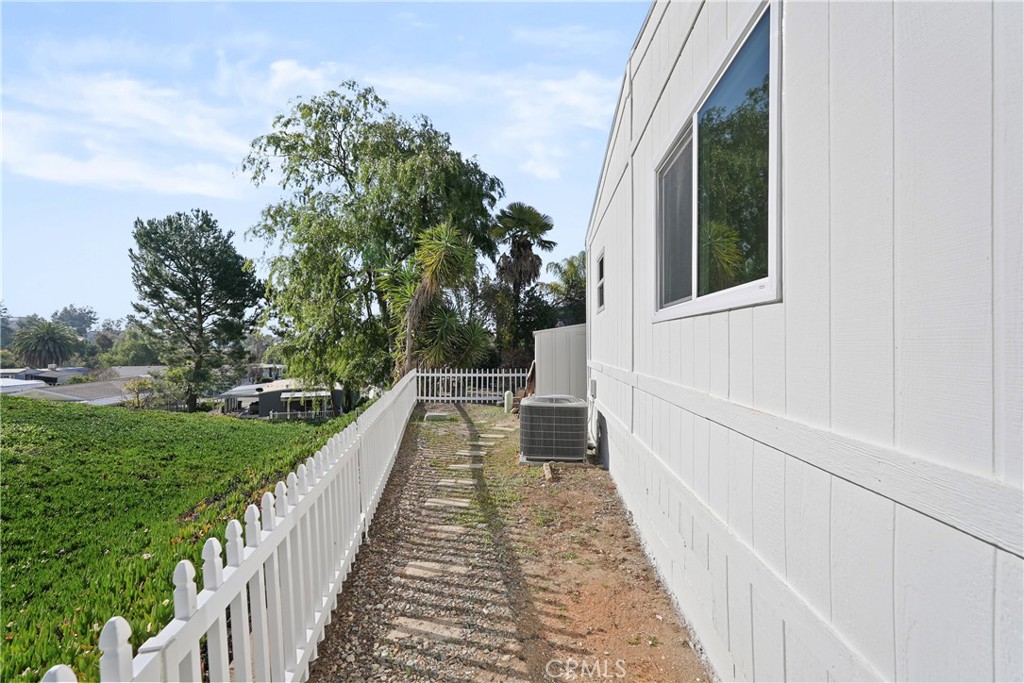 31130 South General Kearny Road, Unit 136 Temecula, CA 92591 - Photo 54 of 65 a view of a house with a yard