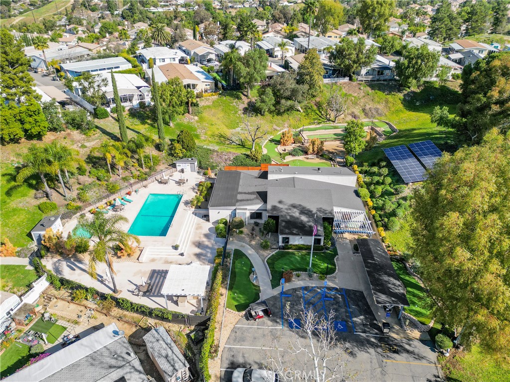31130 South General Kearny Road, Unit 136 Temecula, CA 92591 - Photo 61 of 65 an aerial view of multiple houses with yard
