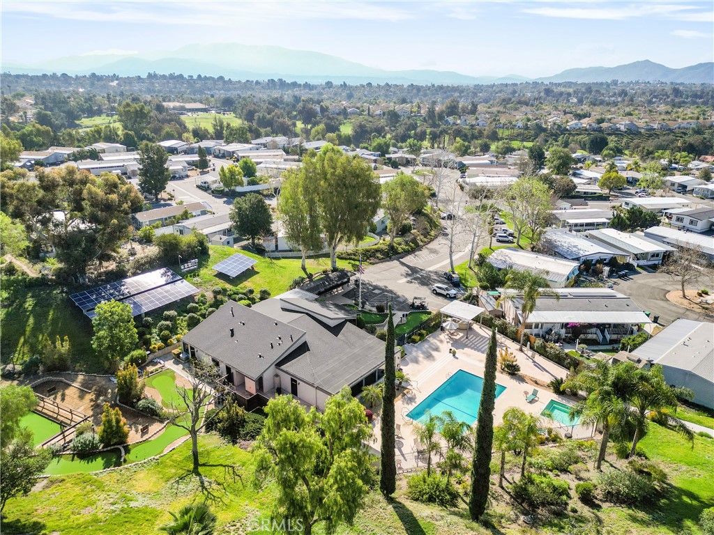 31130 South General Kearny Road, Unit 136 Temecula, CA 92591 - Photo 63 of 65 an aerial view of residential houses with outdoor space and river