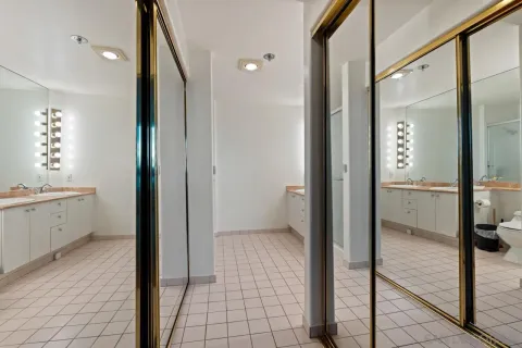 view of a bathroom with tub shower and sink