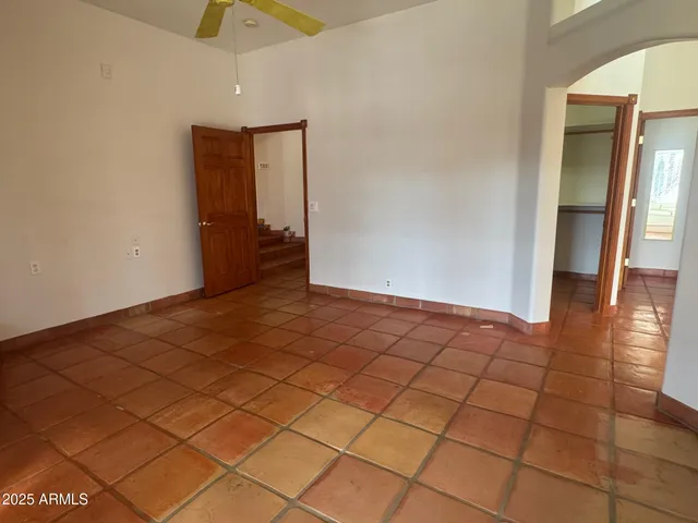 a bathroom with a sink a vanity and a mirror