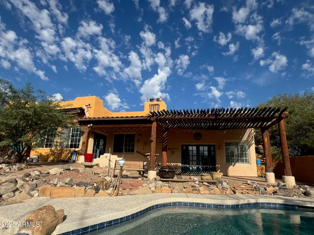 a view of a livingroom with stairs