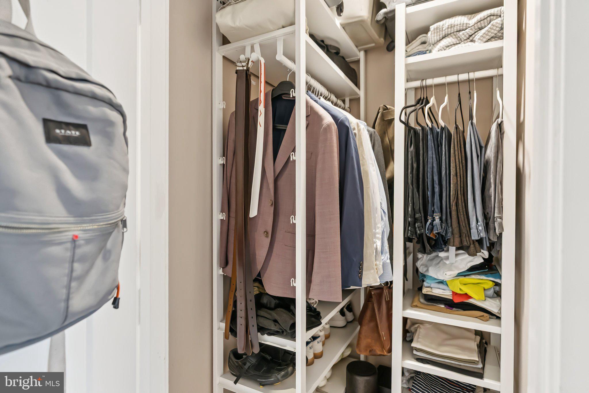 900 11th Street Southeast, Unit 106 Washington, DC 20003 - Photo 16 of 26 a view of walk in closet with clothes and shoes