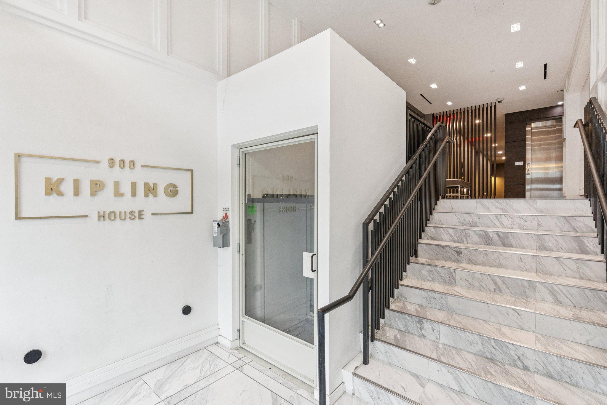 900 11th Street Southeast, Unit 106 Washington, DC 20003 - Photo 2 of 26 a view of entryway with lots of frames and shower