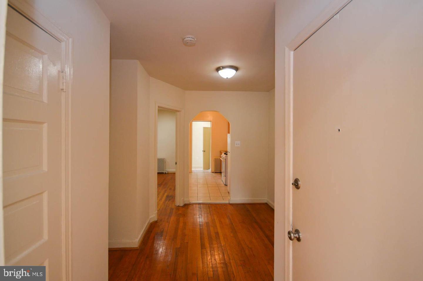 1722 T Street Southeast Washington, DC 20020 - Photo 12 of 23 a view of a hallway with wooden floor