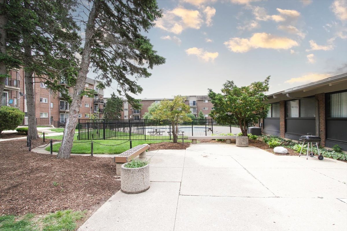 2300 Old Tavern Road, Unit 203 Lisle, IL 60532 - Photo 25 of 26 a view of a park with potted plants and tree