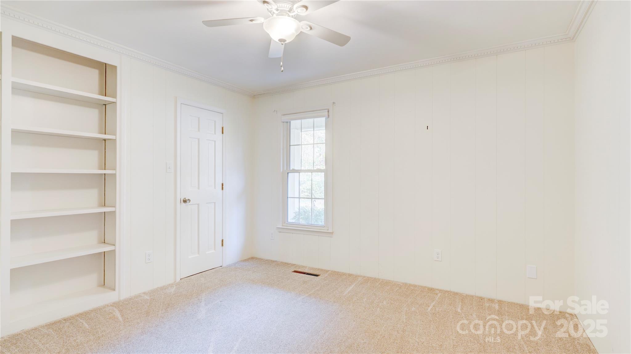 1535 Cripple Creek Road Kannapolis, NC 28081 - Photo 14 of 40 a view of an empty room with a window