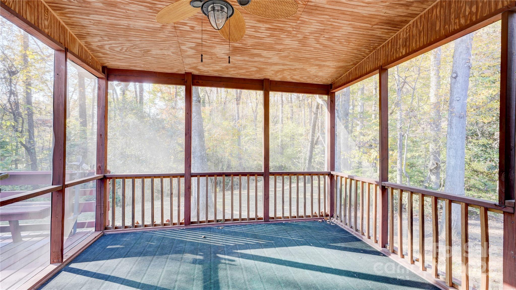 1535 Cripple Creek Road Kannapolis, NC 28081 - Photo 23 of 40 a view of a porch with wooden floor