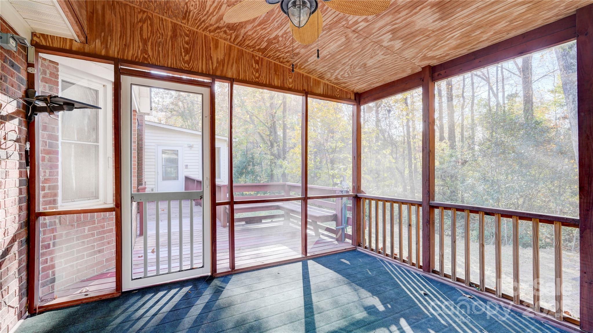 1535 Cripple Creek Road Kannapolis, NC 28081 - Photo 24 of 40 a view of a large room with wooden floor and windows