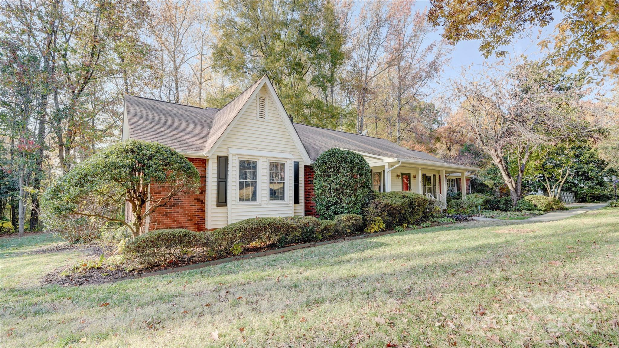 1535 Cripple Creek Road Kannapolis, NC 28081 - Photo 27 of 40 a front view of house with yard and trees around
