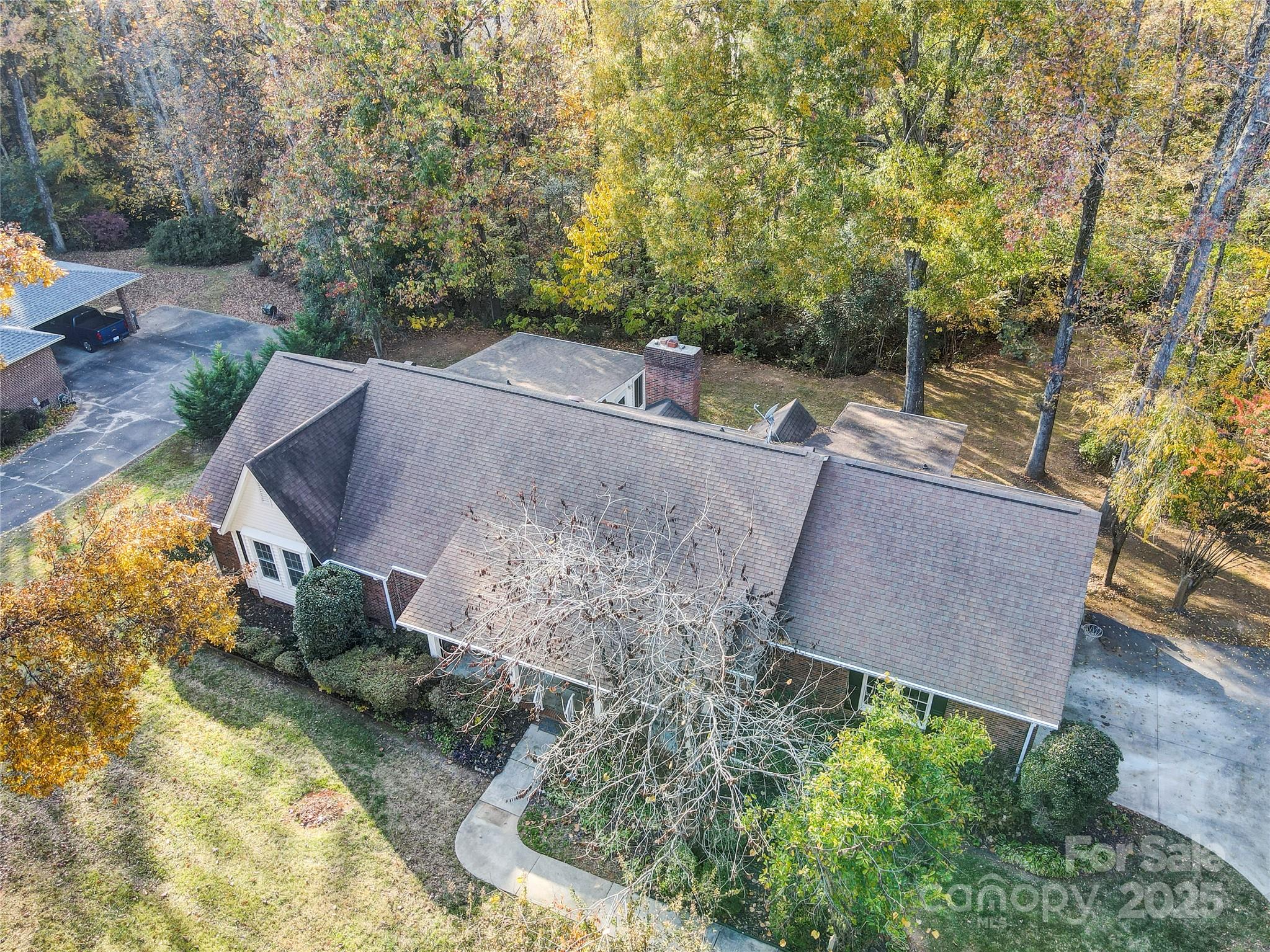 1535 Cripple Creek Road Kannapolis, NC 28081 - Photo 33 of 40 an aerial view of a house with yard and trees in the background