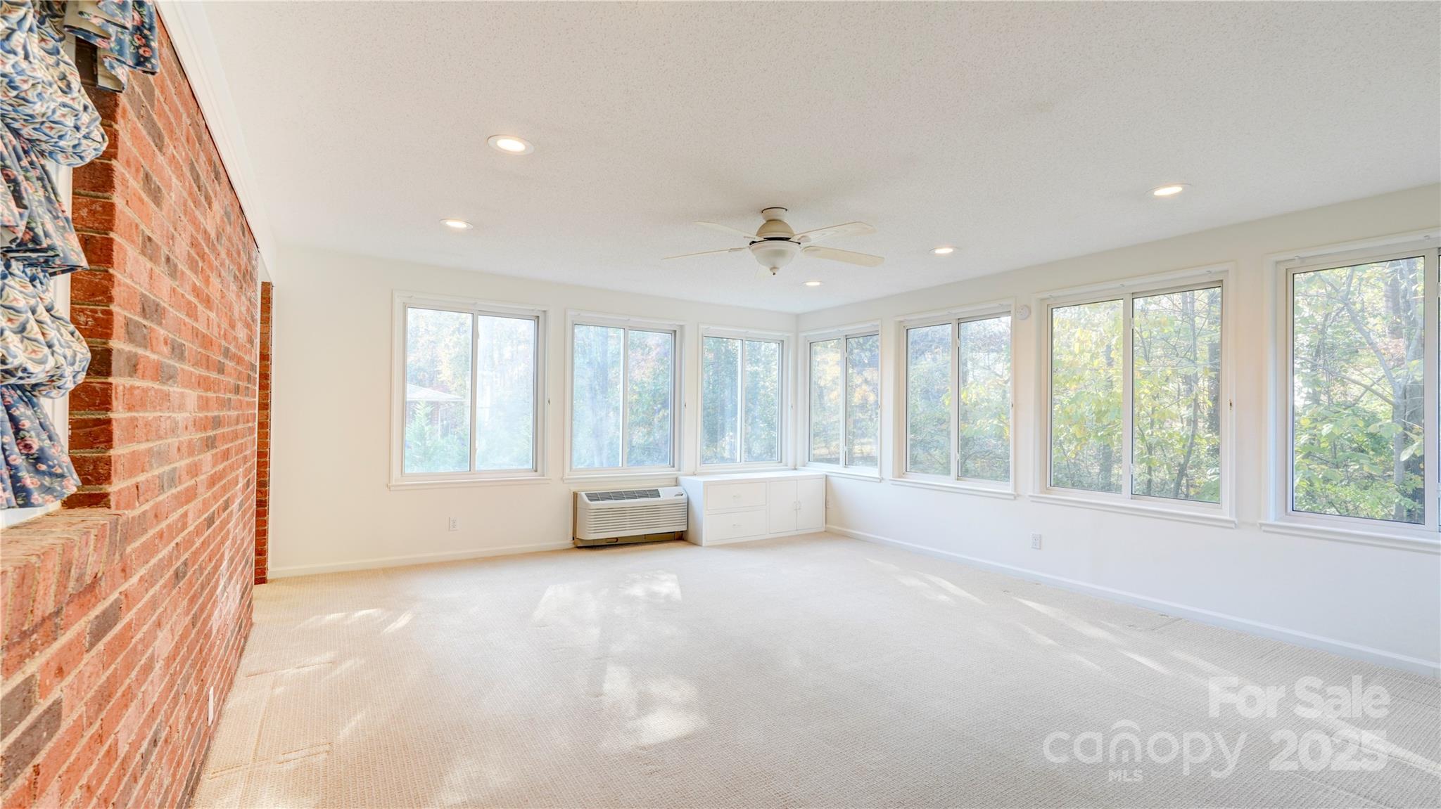 1535 Cripple Creek Road Kannapolis, NC 28081 - Photo 9 of 40 a view of an empty room with a window