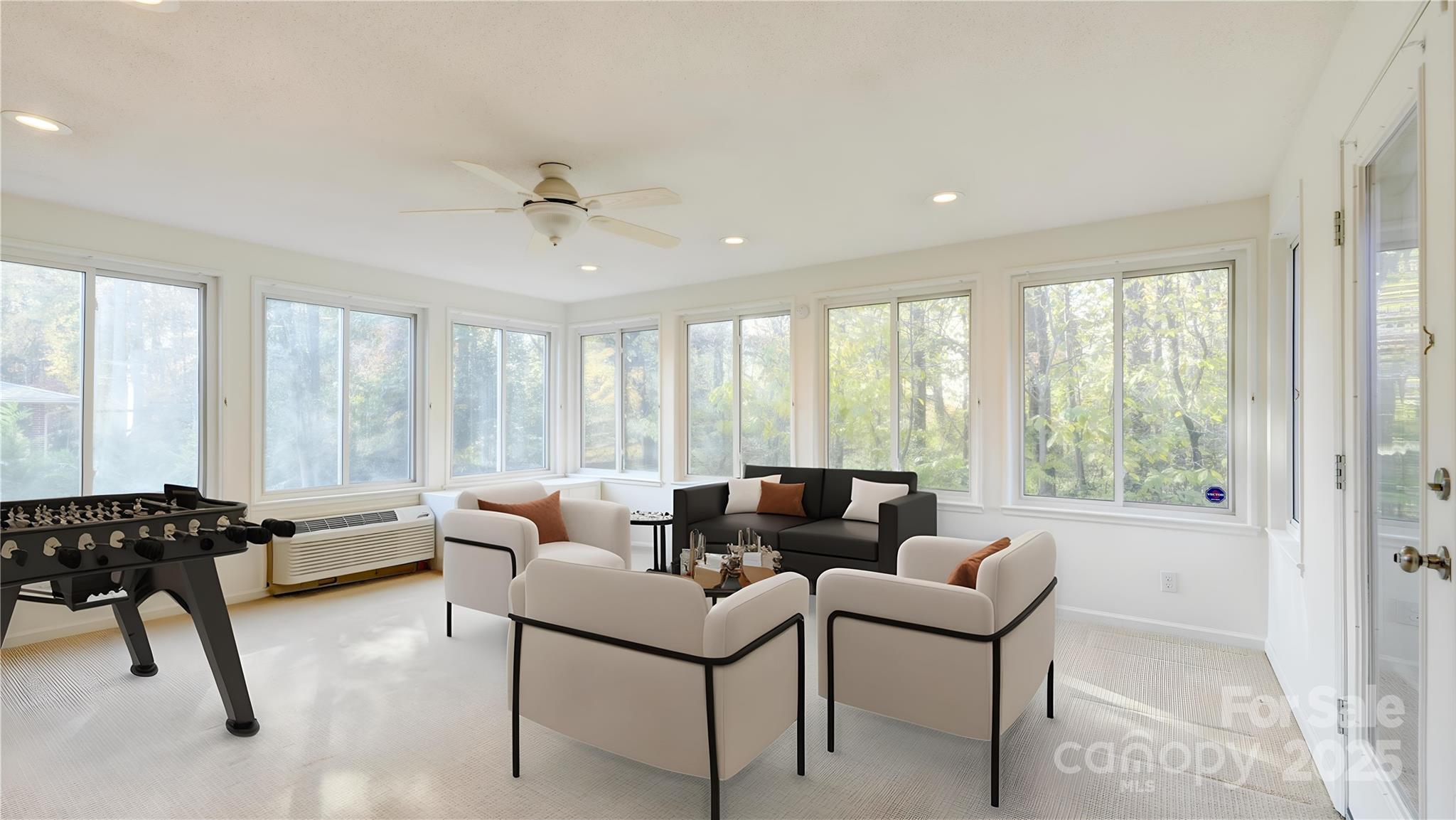 1535 Cripple Creek Road Kannapolis, NC 28081 - Photo 10 of 40 a living room with furniture and floor to ceiling windows