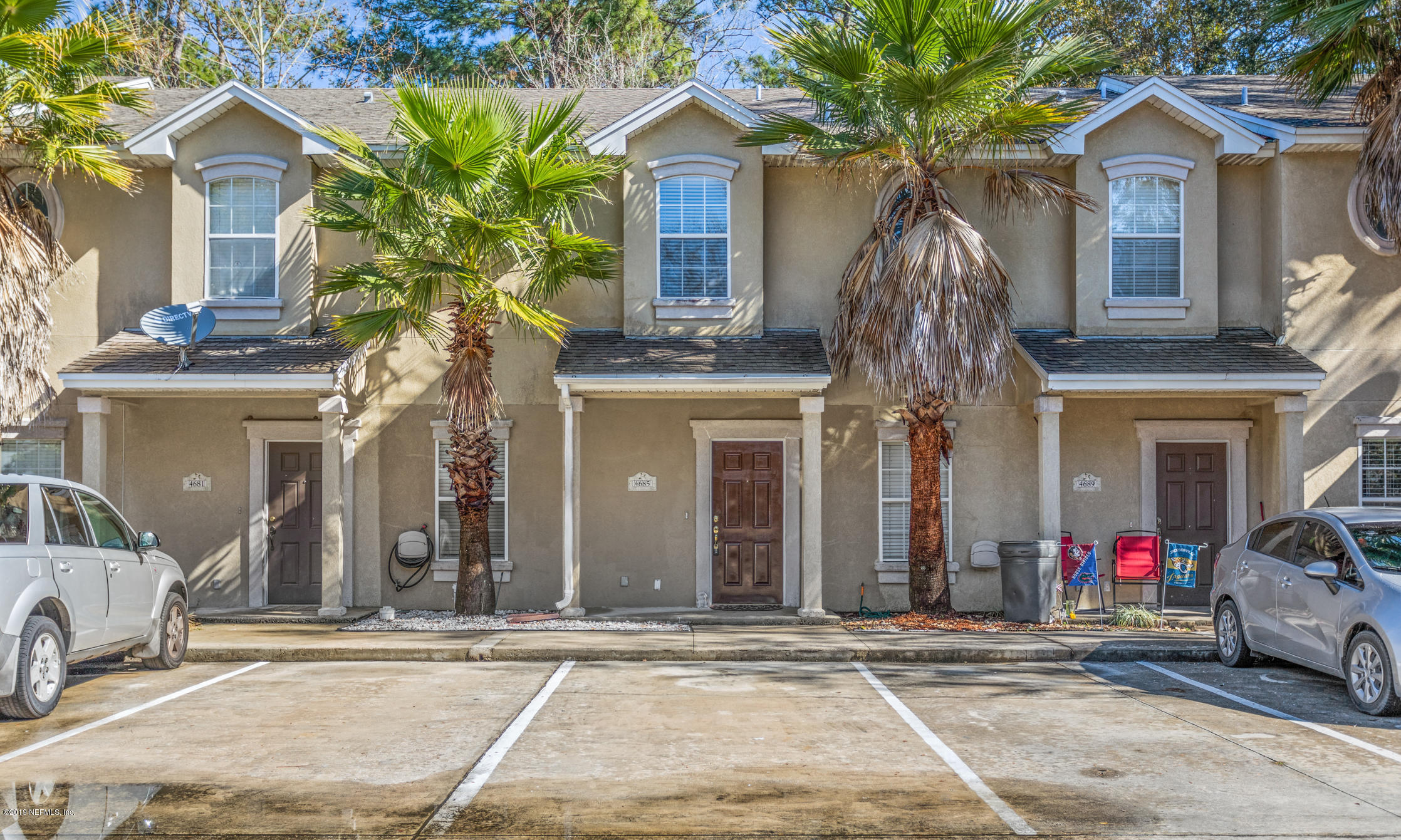 4685 Barnes Road South Jacksonville, FL 32207 - Photo 2 of 29 a front view of a house with garden