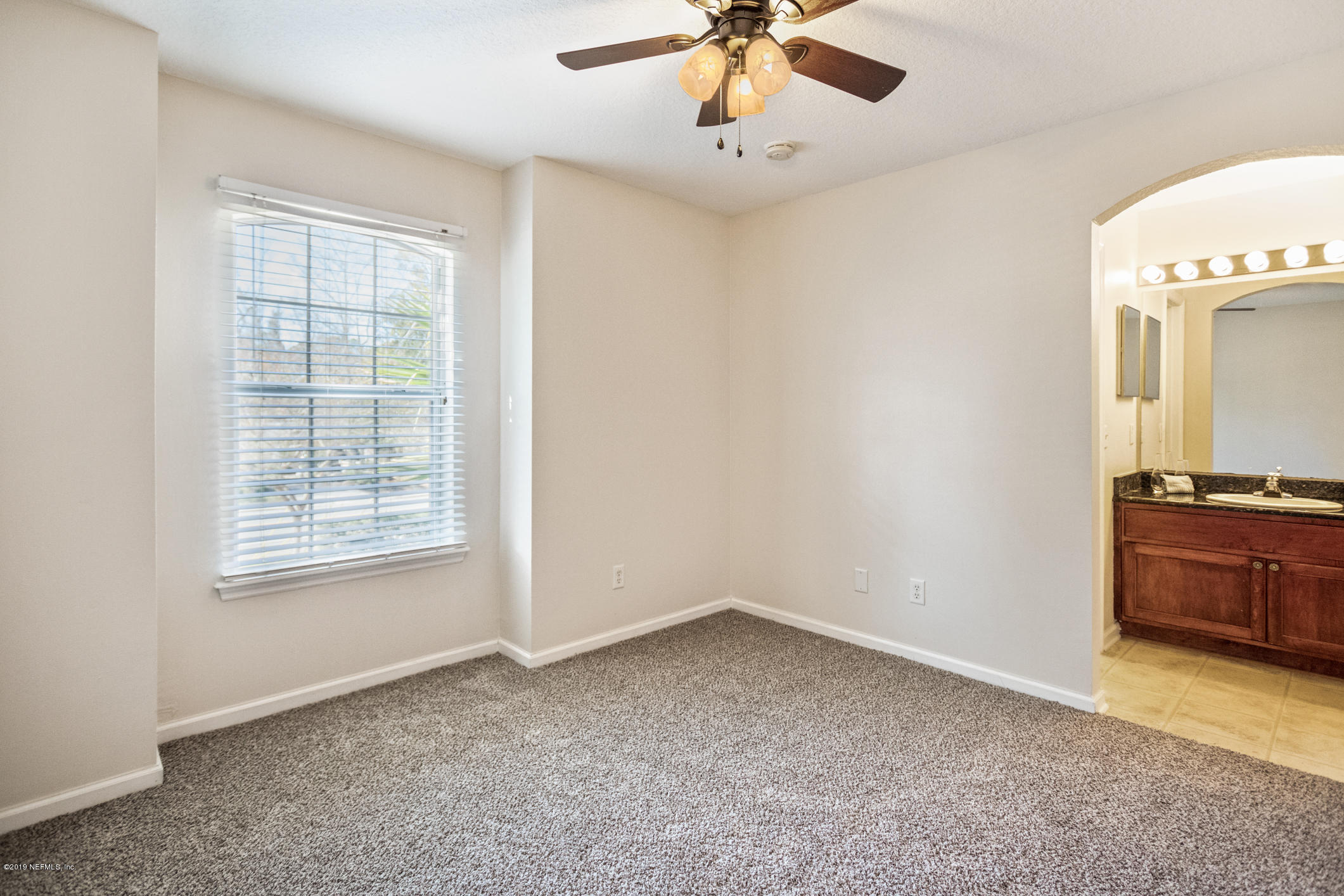 4685 Barnes Road South Jacksonville, FL 32207 - Photo 23 of 29 a view of an empty room with a window