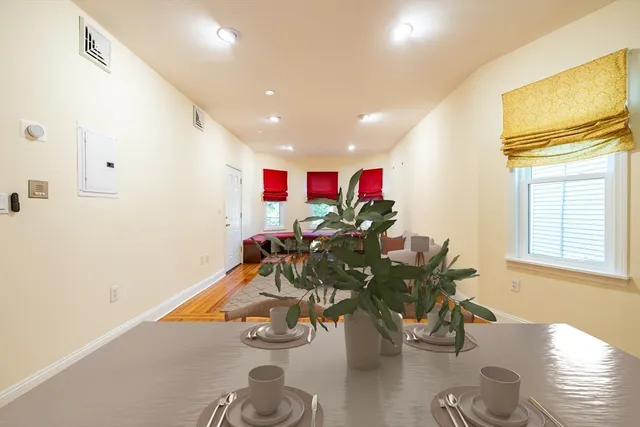 a room with furniture and wooden floor