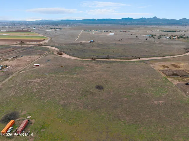 a view of an ocean and a mountain