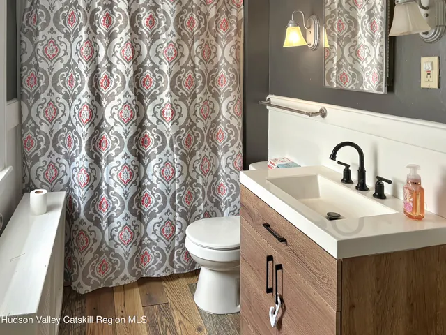 a bathroom with a sink and a toilet