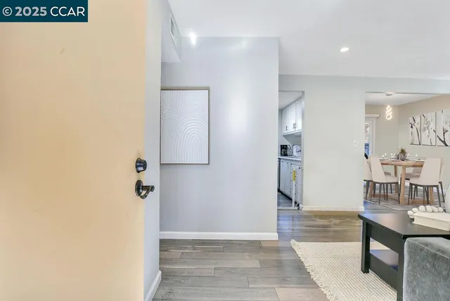 a view of a bathroom from the hallway