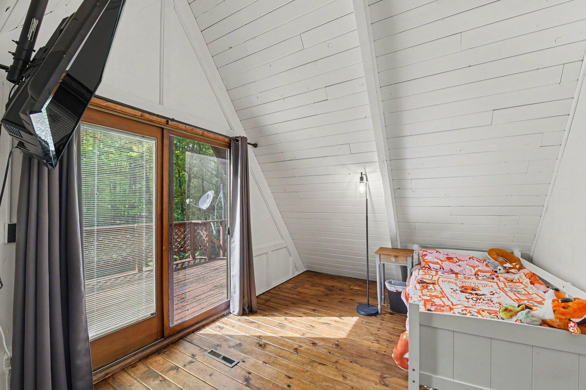 2055 North Springbrook Road Boyne Falls, MI 49713 - Photo 9 of 25 upper level bedroom
